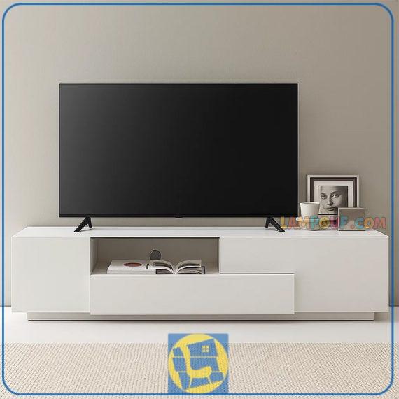 میز LCD مدل TTJ49 دارای طراحی به صورت کشو دار و درب دار و قفسه دار که به عنوان استند تلویزیون و زیر تلویزیونی دکوری زیبا در تی وی روم و پذیرایی ایجاد می‌کند.