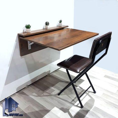 میز تحریر دیواری STDP105 به صورت تاشو و کمجا به همراه صندلی که به عنوان میز کار و لپ تاپ و میز مطالعه در اتاق در کنار سرویس خواب قرار می‌گیرد.