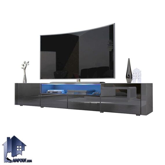 میز تلویزیون مدل TTJ103 دارای درب داشبوردی و جکدار و به صورت کشو دار که به عنوان استند LCD و LED و زیر تلویزیونی در تی وی روم قرار می‌گیرد.