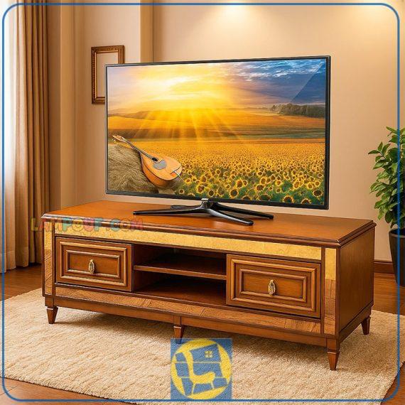 میز تلویزیون مدل TTA315 چوبی با حاشیه آینه کاری و به صورت کشو دار که به عنوان زیر تلویزیونی و استند و براکت LCD و LED در تی وی روم و پذیرایی قرار می‌گیرد.