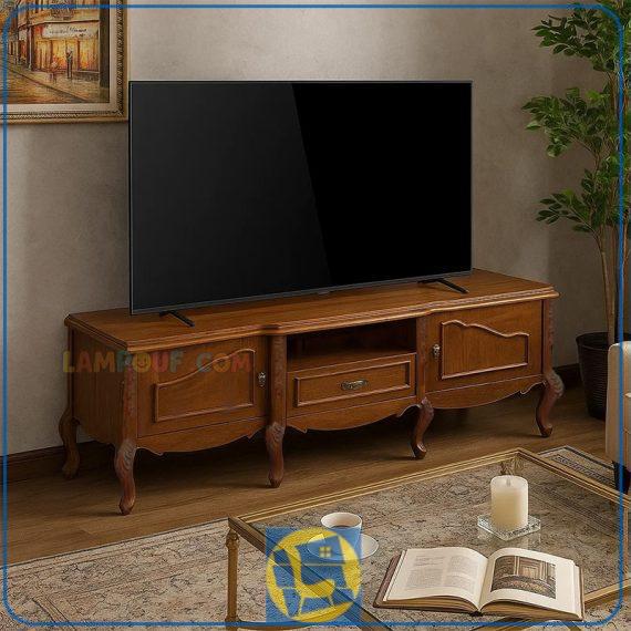میز تلویزیون TTA2026 چوبی دارای کشو و قفسه که به عنوان استند و کنسول ال ای دی یا ال سی دی در تی وی روم و پذیرایی مورد استفاده قرار می‌گیرد.