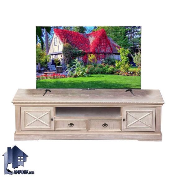 میز تلویزیون TTA10100 چوبی کشو دار و قفسه دار که به عنوان استند زیر تلویزیونی یا کنسول LCD یا LED در تی وی روم یا پذیرایی استفاده می‌شود.