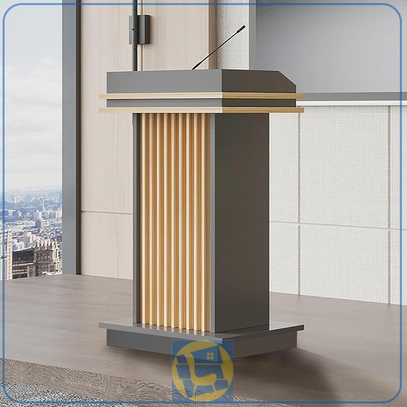 TDJ110 (1) میز تریبون TDJ110، دارای طراحی مدرن و منحصر به فرد انتخابی شایسته برای محیطهایی است که هم ظاهر زیبا و هم عملکرد بالا اهمیت دارد.